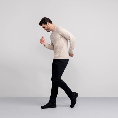 The Legacy Polo Sweater in Beige, flat lay on white background.