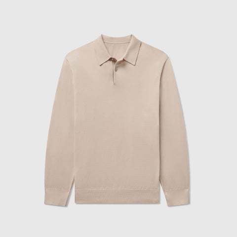 A man wearing the Legacy Polo Sweater in Beige.