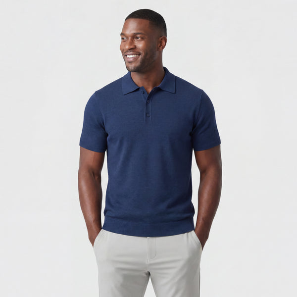 A man wearing the Legacy Resort Polo in Harbor Blue