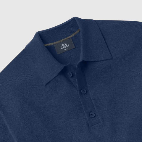 The Legacy Resort Polo in Harbor Blue in an outdoor lifestyle setting