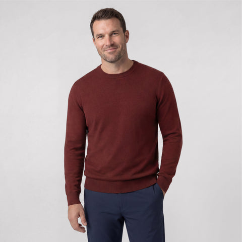 A man wearing the Anytime Crewneck Sweater in Maroon