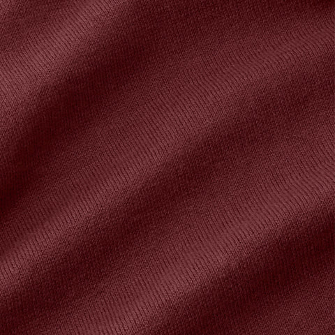A man wearing the Legacy Resort Polo in Maroon