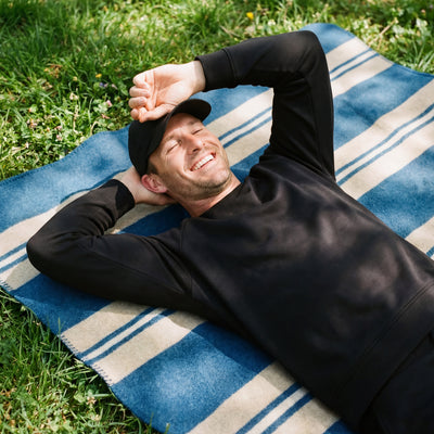 A man wearing the Sandwash Crewneck in True Black.