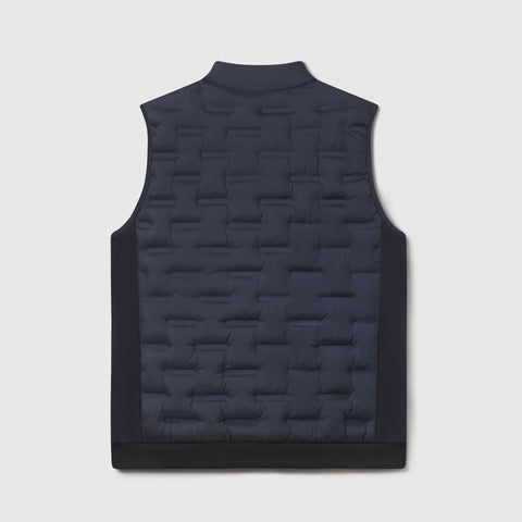 Deep blue quilted Drive vest shown flat from the back.