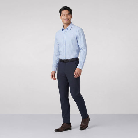 A secondary view of a man in the Everywear Shirt Standard Length in Fine Stripe.