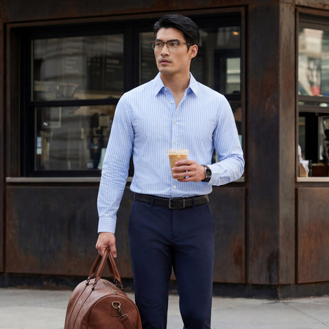 The Everywear Shirt Standard Length in Fine Stripe worn in a lifestyle setting.