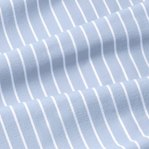 The Everywear Shirt Standard Length in Fine Stripe styled in a lifestyle setting.