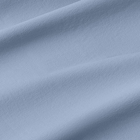 The Everywear Shirt Shorter Length in Chambray Blue styled for versatile wear.
