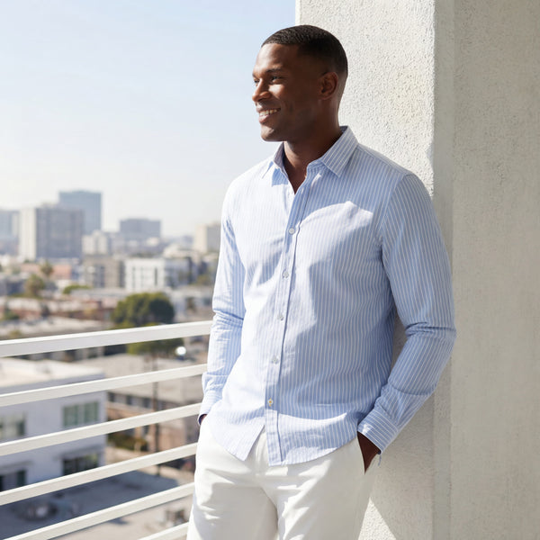 The Everywear Shirt Shorter Length in Fine Stripe worn in a lifestyle setting.