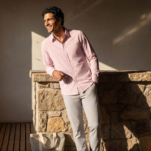 The Everywear Shirt Shorter Length in Soft Rose worn in a lifestyle setting.