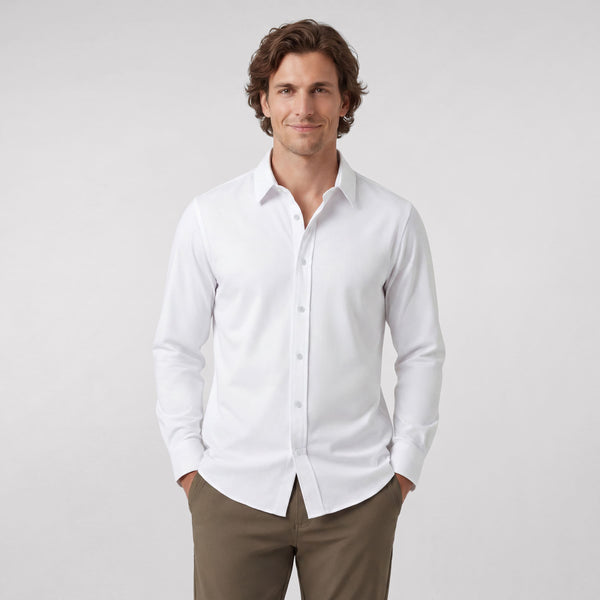 A man wearing the Everywear Shirt Shorter Length in True White with a classic fit.