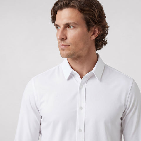 The Everywear Shirt Shorter Length in True White, folded flat on a neutral background.
