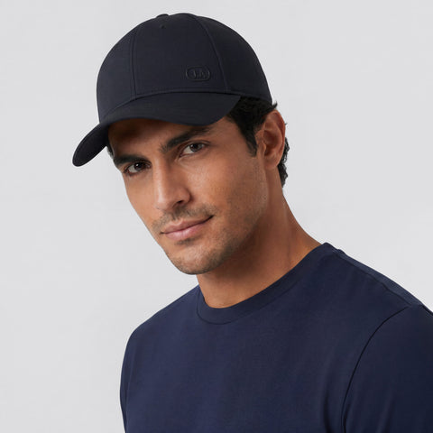 A man wearing the Club Performance Hat in Black