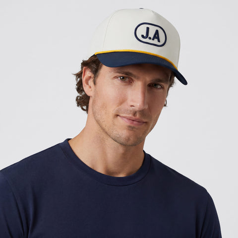 A man wearing the Archer Rope Hat in Cool Gray