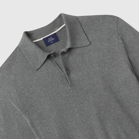 Close-up of the cream-tipped collar and Jack Archer neck label on the heather grey knit polo.