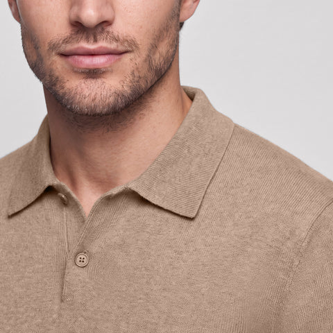 Close-up of the open collar and two-button placket on the mocha heather knit polo.