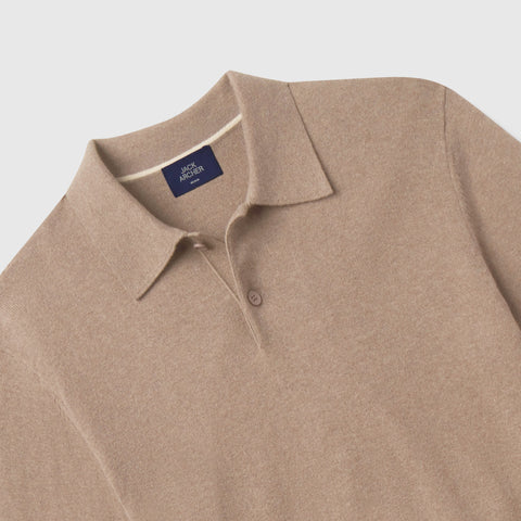 Close-up of the cream-tipped collar and Jack Archer neck label on the mocha heather knit polo.