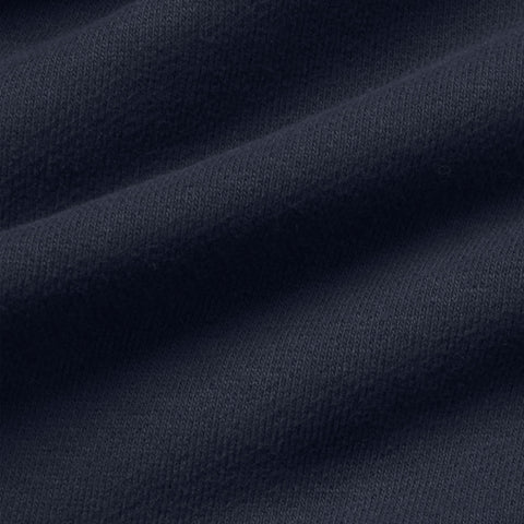 Close-up of midnight navy terry fabric.