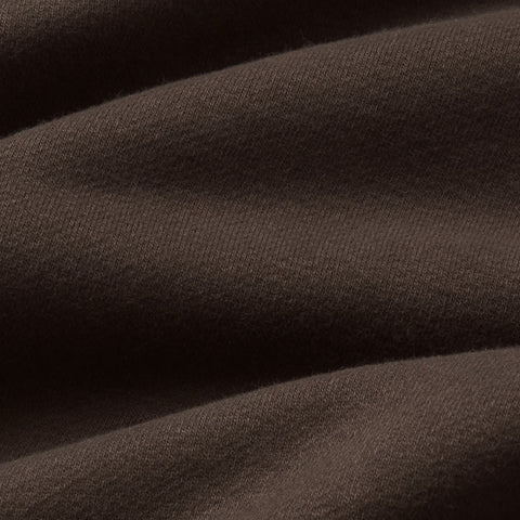Close-up of espresso brown terry fabric.