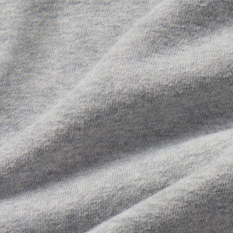 Close-up of heather gray terry fabric.