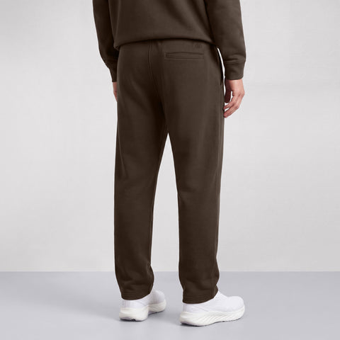 Espresso brown sweatpants shown from the back, with a welt back pocket.
