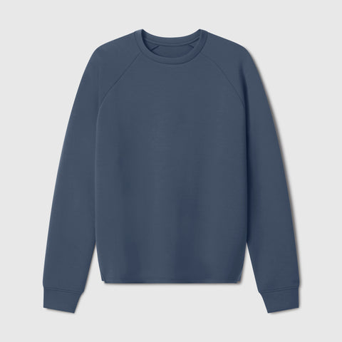 Lifestyle shot of the Sandwash Crewneck in Tidal Blue