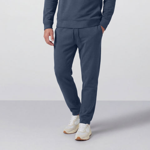 A man wearing the Sandwash Jogger in Tidal Blue, front view.