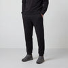 A man wearing the Sandwash Jogger in True Black, front view.