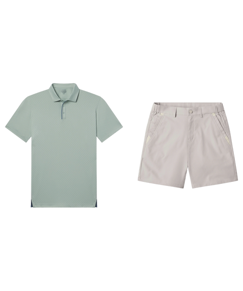 Sage green dotted performance polo paired with pale stone shorts, shown flat.