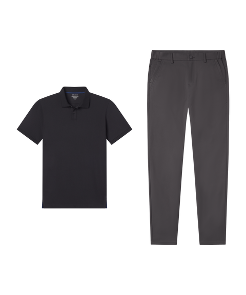 Travel outfit flat lay: Clubhouse Pique Polo in True Black paired with charcoal pants