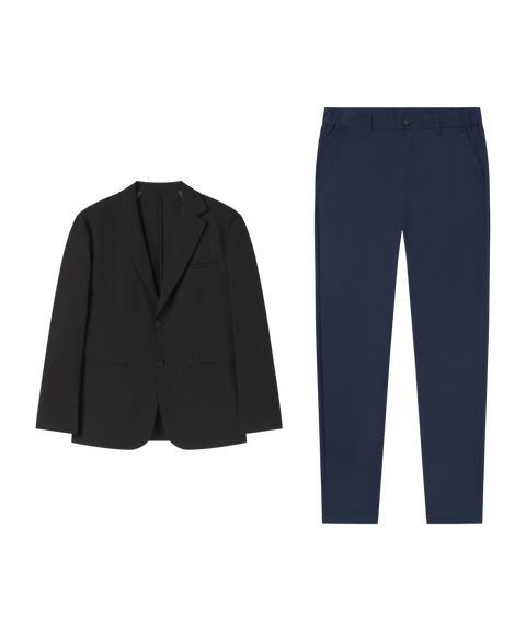 Travel outfit flat lay: Jetsetter Blazer in True Black paired with navy pants