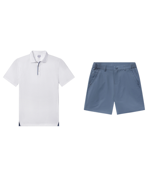 White textured polo with navy placket trim paired with slate blue shorts, shown flat.