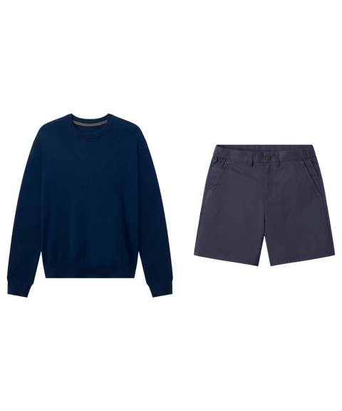Navy crewneck sweater paired with navy tech shorts, shown flat.