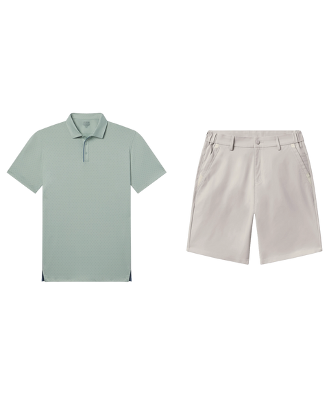 Sage green dotted performance polo paired with pale stone shorts, shown flat.