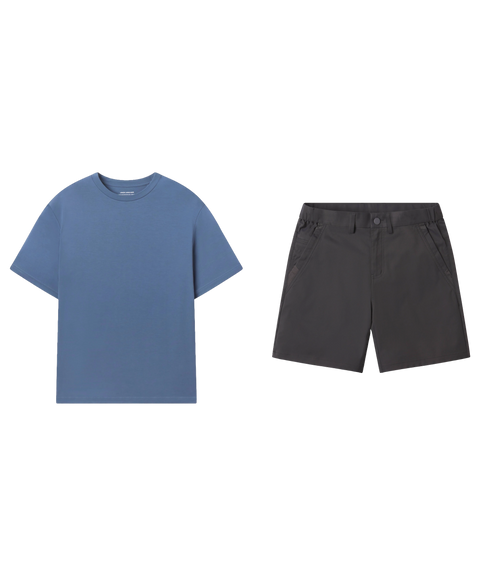Steel blue crewneck tee paired with dark charcoal chino shorts, shown flat.