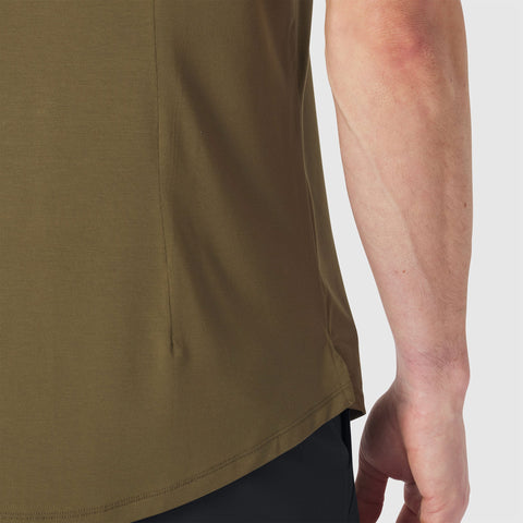 The Anytime Tee in Olive Green displayed in a lifestyle setting