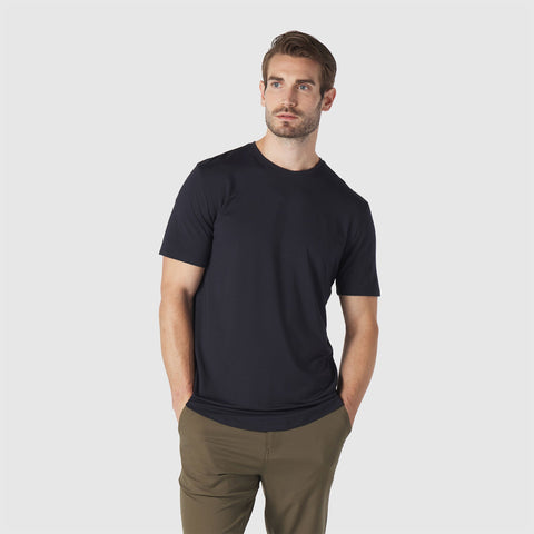 A man in the Anytime Tee, casual outdoor setting