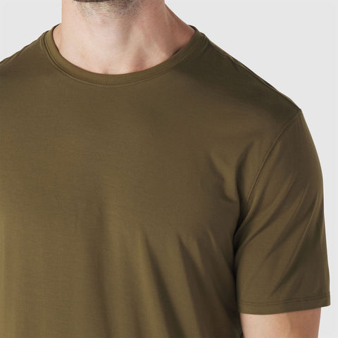 The Anytime Tee in Olive Green in a casual setting